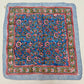 Pañoleta azul enredadera rosa