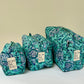 Set de 3 bolsas Turquesa con flores azul y blanco